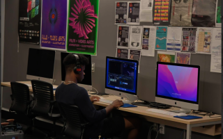 Student using computer programs to edit videos